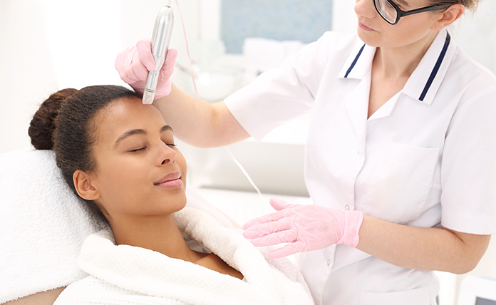 Microneedling with RF treatment